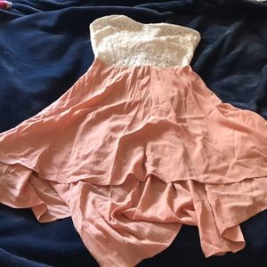 High-low strapless dress with bow back